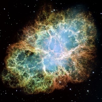 超新星爆発の残骸の代表例とされるおうし座のかに星雲。このような星間物質が存在する空間を地球は過去数千年間に通過している。 (c) NASA, ESA, J. Hester and A. Loll (Arizona State University)