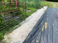防護柵の下に敷いたコンクリートキャンバス（画像: 太陽工業の発表資料より）