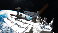 Photo of exterior view of the International Space Station, taken by NASA astronaut Ron Garan during a spacewalk conducted on July 12, 2011. The photo shows the space station with a Fisheye Camera and the curvature of Earth below. (NASA)