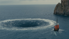 Odysseus and his men row hard against the Charybdis in a scene of the upcoming film, the Odyssey. (Universalpictures.com)