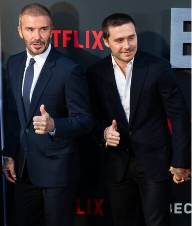 デビッド・ベッカムとブルックリン・ベッカムがNetflix「ベッカム」の英国プレミアにてロロ・ピアーナを着用