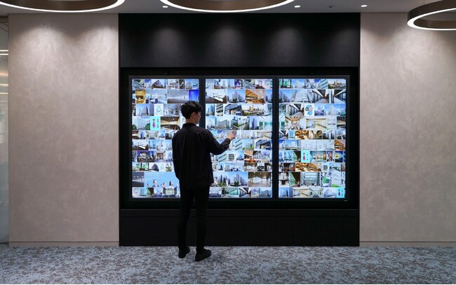 チームラボ、ダイビル本社6階エントランスに、タッチパネルサイネージ「Digital Information Wall」を導入。ダイビルの魅力をインタラクティブに伝える。