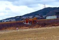 【50kg超を積載した大型試作ドローンの飛行実験に成功】山間地・被災地向け物資輸送用　固定翼大型ドローンの開発に弾み。金沢工業大学 赤坂剛史研究室