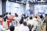 未来と令和・昭和をつなぐ！！ 多世代共創ワークショップを同志社女子大学の学生が大阪・関西万博で開催！