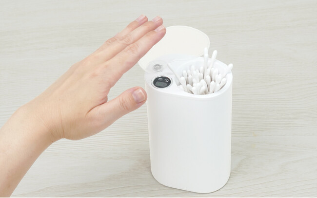 ニョロニョロ～っとただ綿棒を取り出しやすくするためだけの電動綿棒ケース『綿棒おしあげくん』を発売