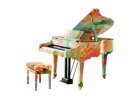 「パラリンアート」作品のラッピングを施したローランドのデジタル・グランドピアノ