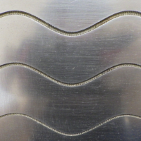 アルゴヴィジョンテクノロジズ、革新的「流体研磨技術」で半導体製造装置部品の精密仕上げを実現