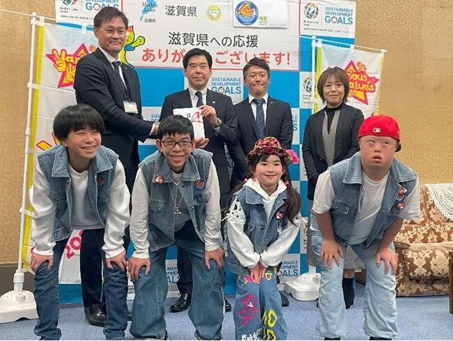 ＮＸワンビシアーカイブズ、「WAN-Sign Project×smile rainbow」を通じて滋賀県「滋賀応援寄附」へ寄付