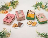 老舗洋菓子メーカーロイスダール×人気イラストレーターくらはしれいのコラボレーション企画　絵本の様なデザイン缶のリーフパイとクッキーを数量限定で販売。