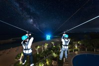 【シェラトン沖縄サンマリーナリゾート】沖縄の夜に海を駆け抜ける、新感覚体験へ。日本唯一である全長250ｍの海越えジップラインにて、期間限定「ナイトジップライン」を開催